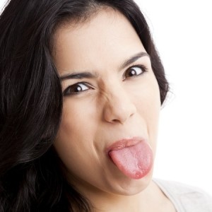 young woman with her tongue out-9523271_s - Geographic Tongue | Healthy ...